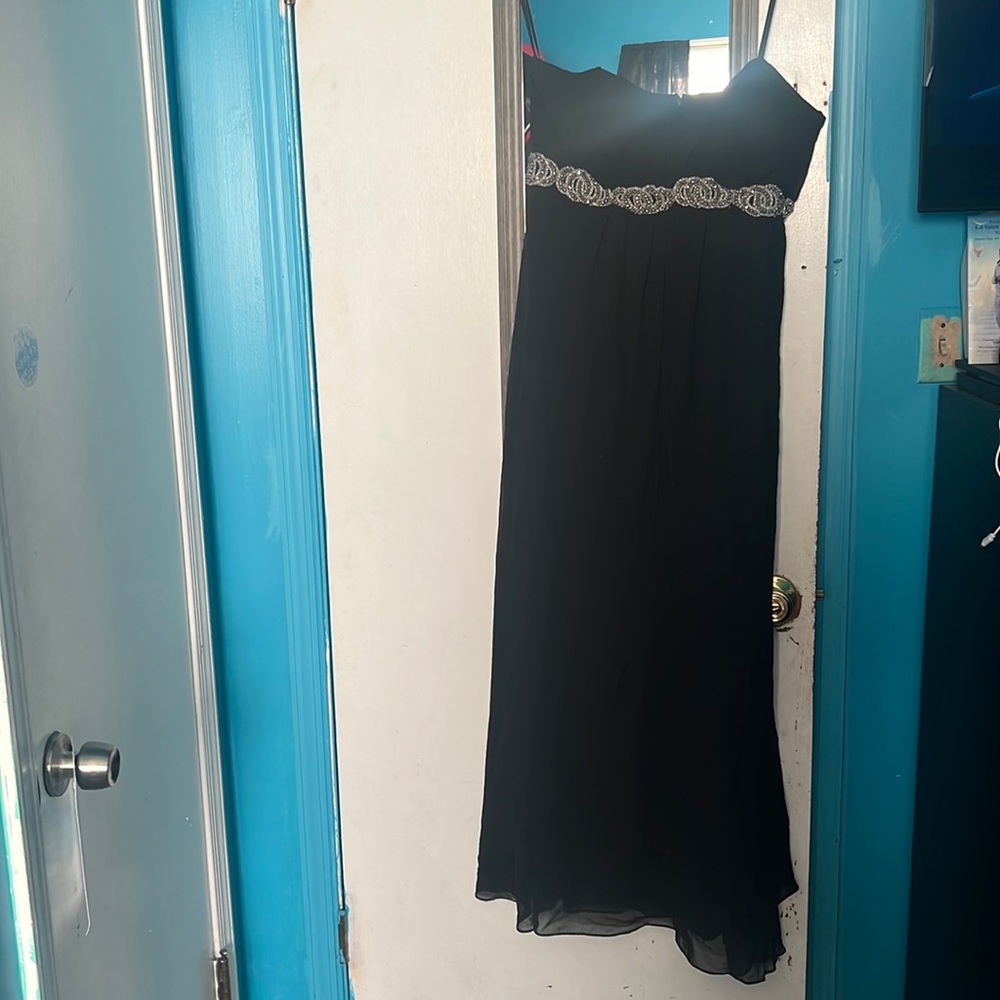 Worn to a wedding once. Sheer black shoulder less dress